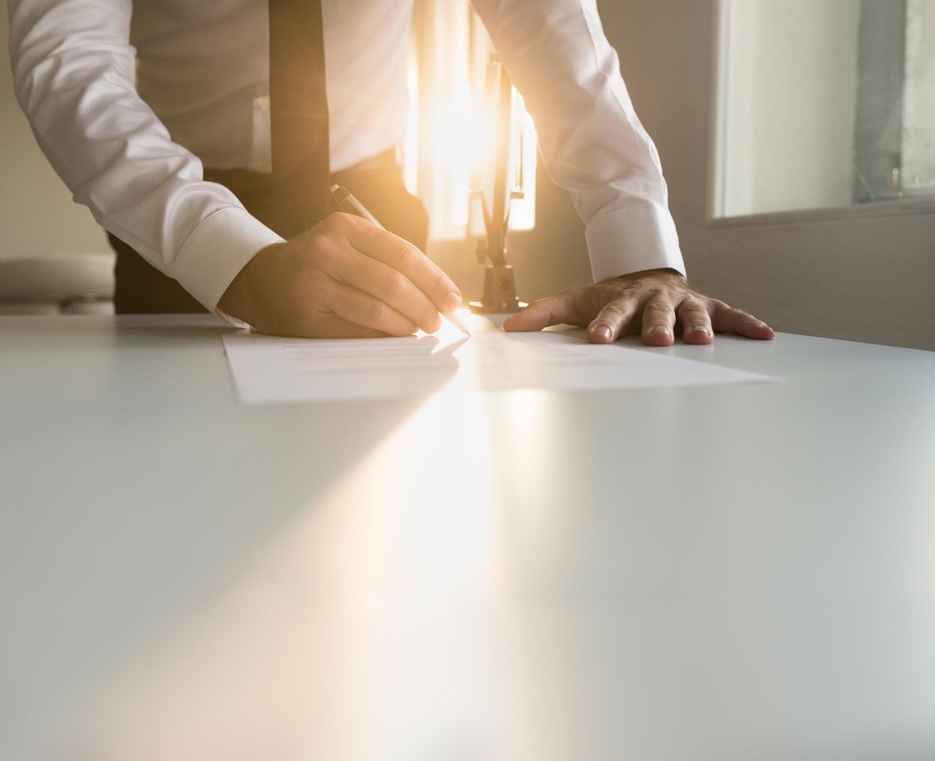 Hayes & Hayes Attorneys at Law | Rock Hill, SC | man signing a document on a table with an ink pen